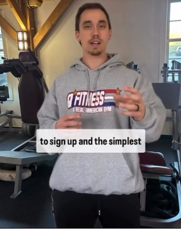 Andrew explaining Q Fitness membership and pricing